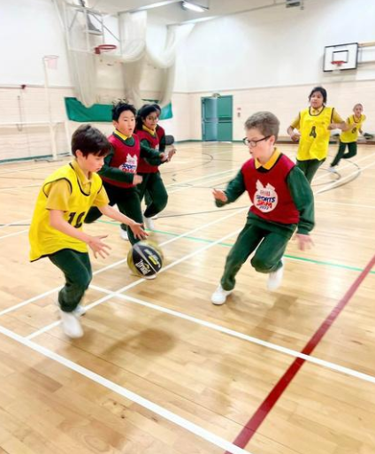 children playing basket ball