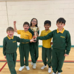 children holding a trophy