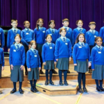 children stood on stage