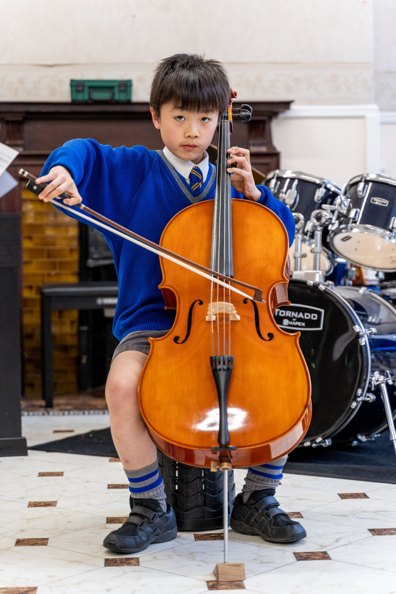 Boy playing the cello