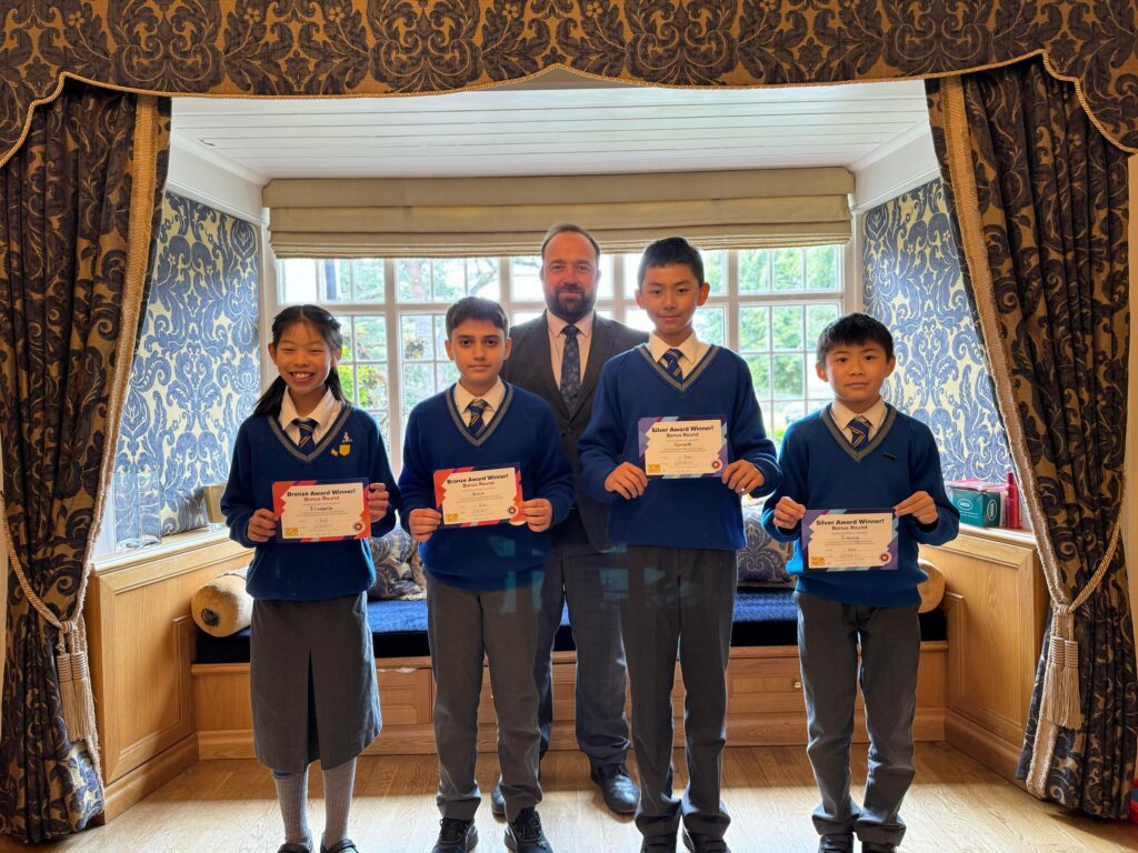 students holding certificates