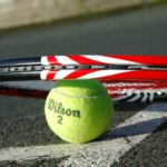 tennis ball and racket
