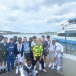 group of boys by the pier
